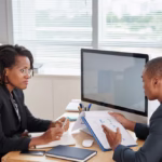 afro-american-man-suit-holding-documents-talking-female-boss_1098-20604 afro-american-man-suit-holding-documents-talking-female-boss_1098-20604